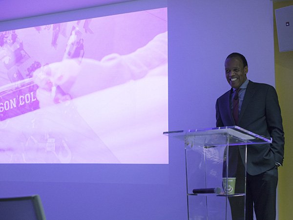 Lee Pelton speaking at podium.