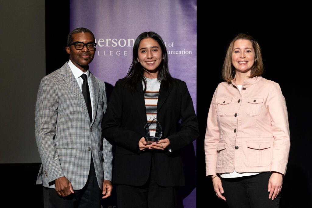 Stefani Davila receiving award