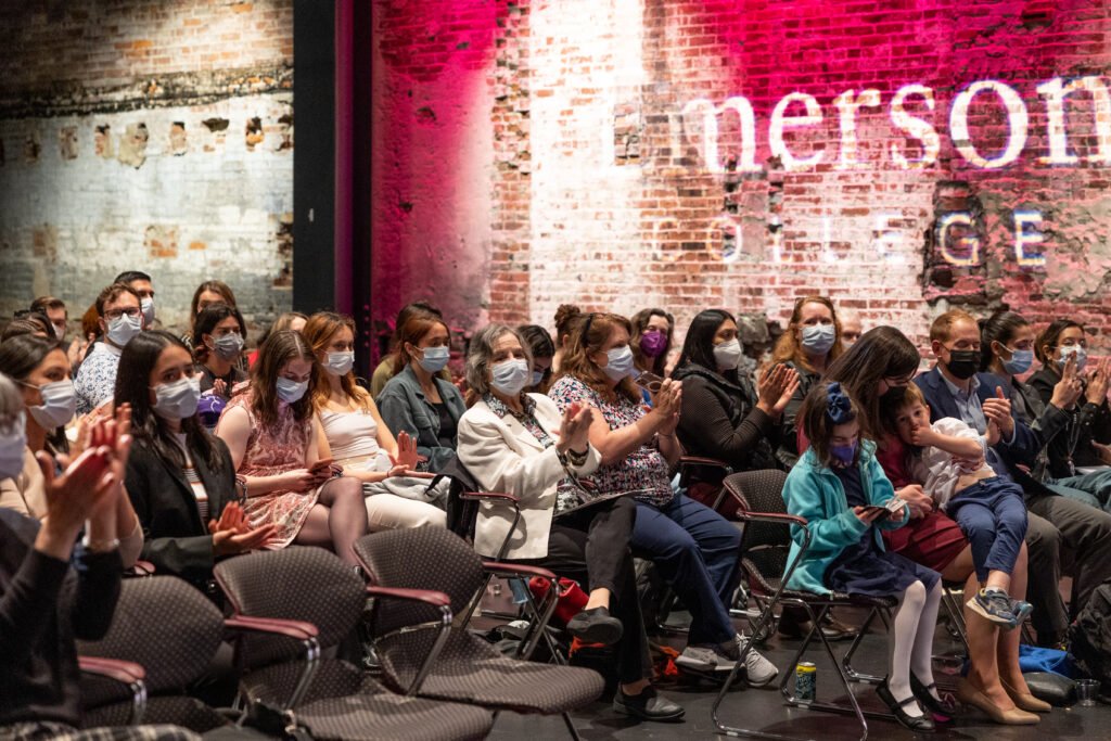 Attendees sitting in the audience