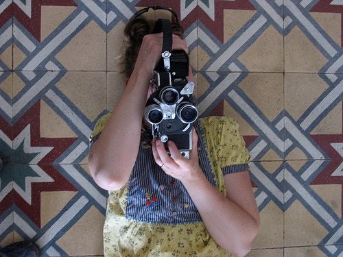 Ramey behind a camera