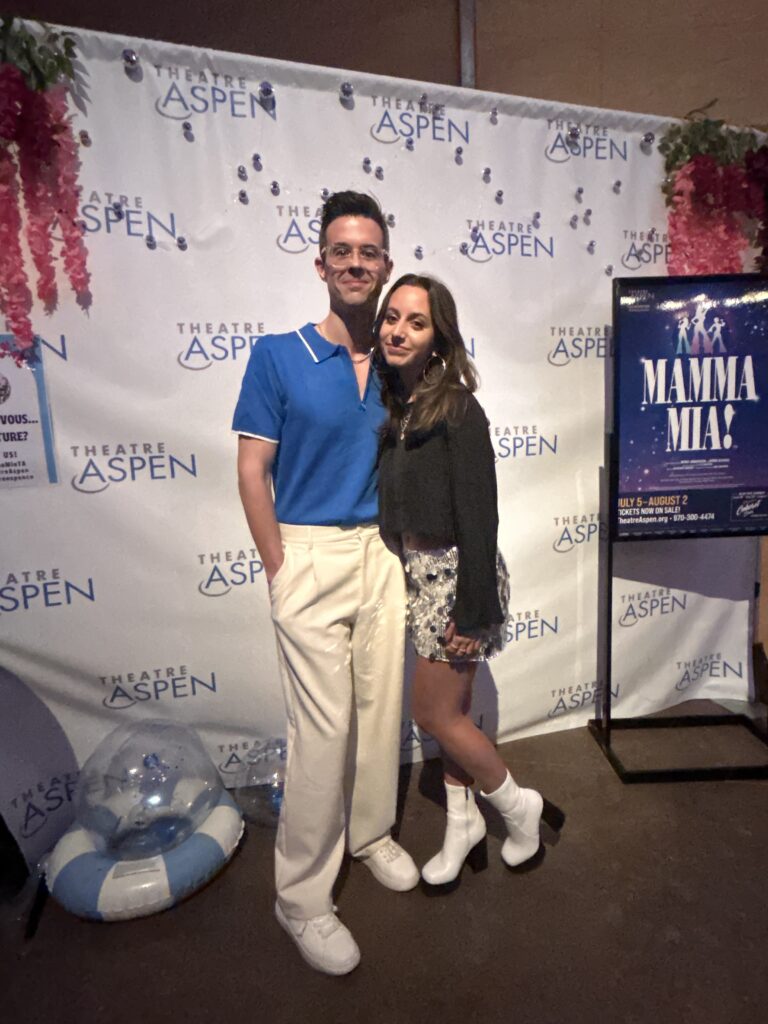 Michael Bello and Gabriella David stand together