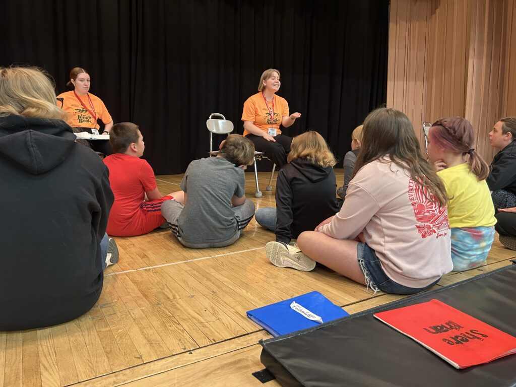 Amelia Duval teaching a group of children