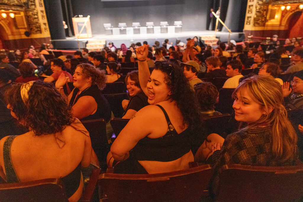Students in audience cheer
