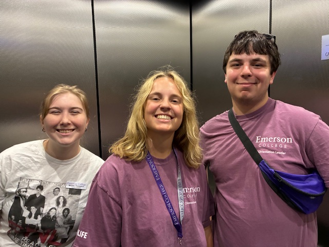 Maddie Thompson, Riley Caiazza, and Liam Alexe pose for photo in an elevator