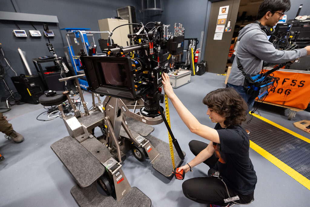 A student works on with an ARRI digital motion picture camera system