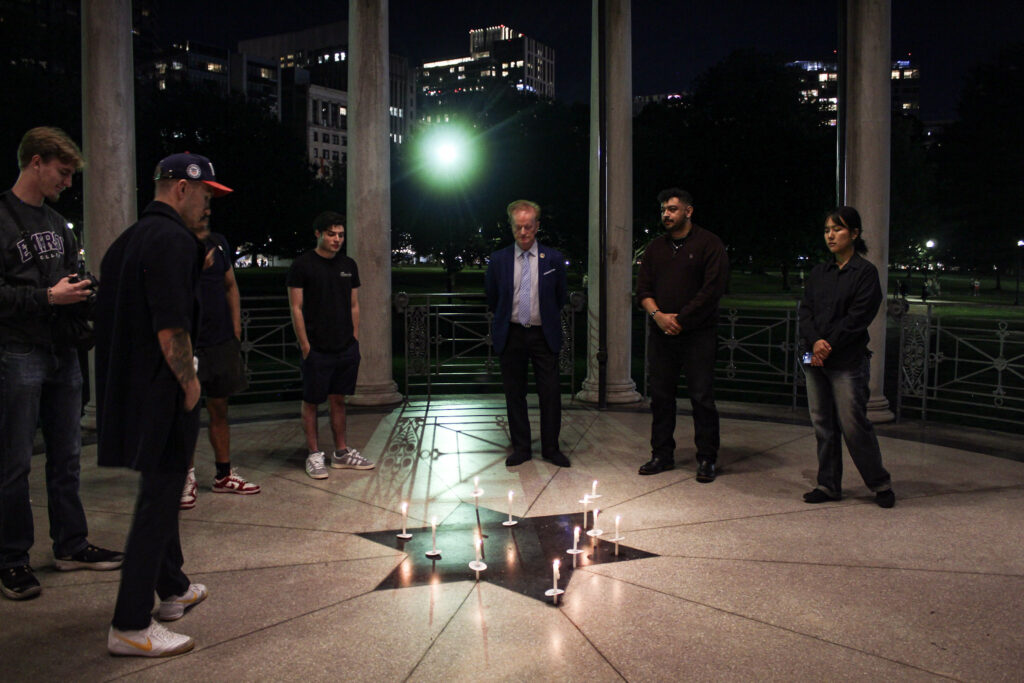 Communication Studies Professor and Chair Greg Payne leads the vigil