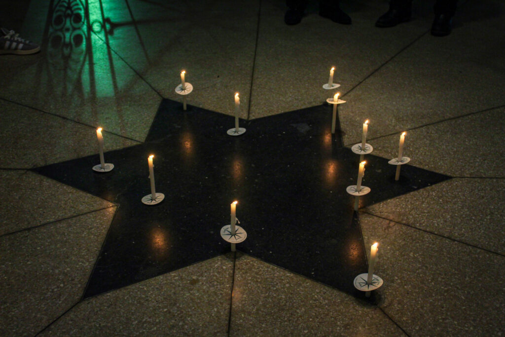 Candles on the ground on a star
