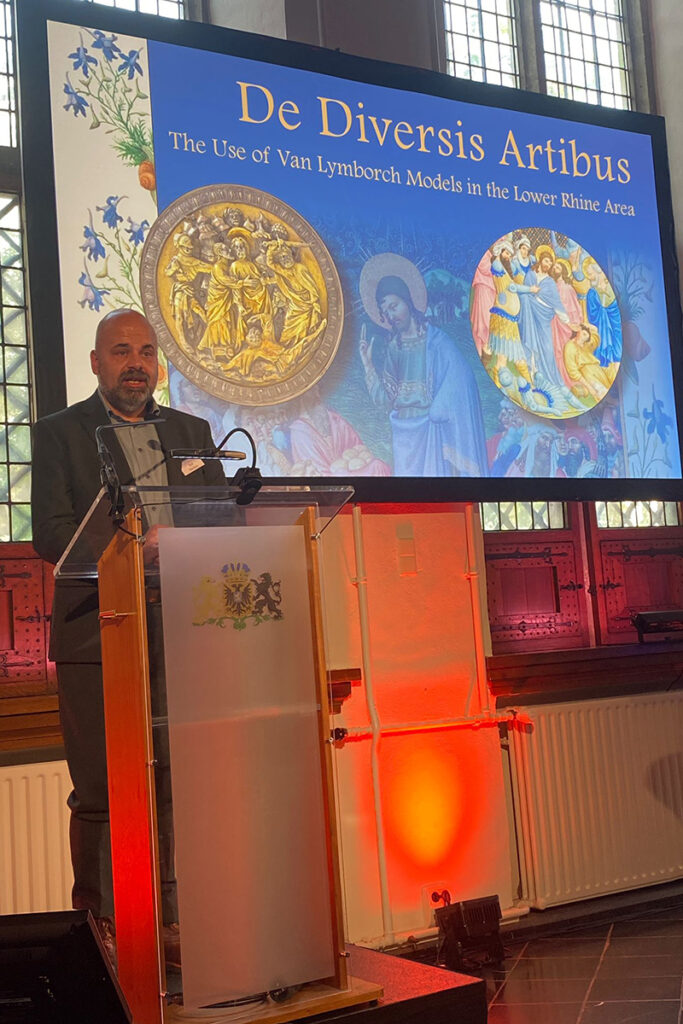 man speaks at podium 