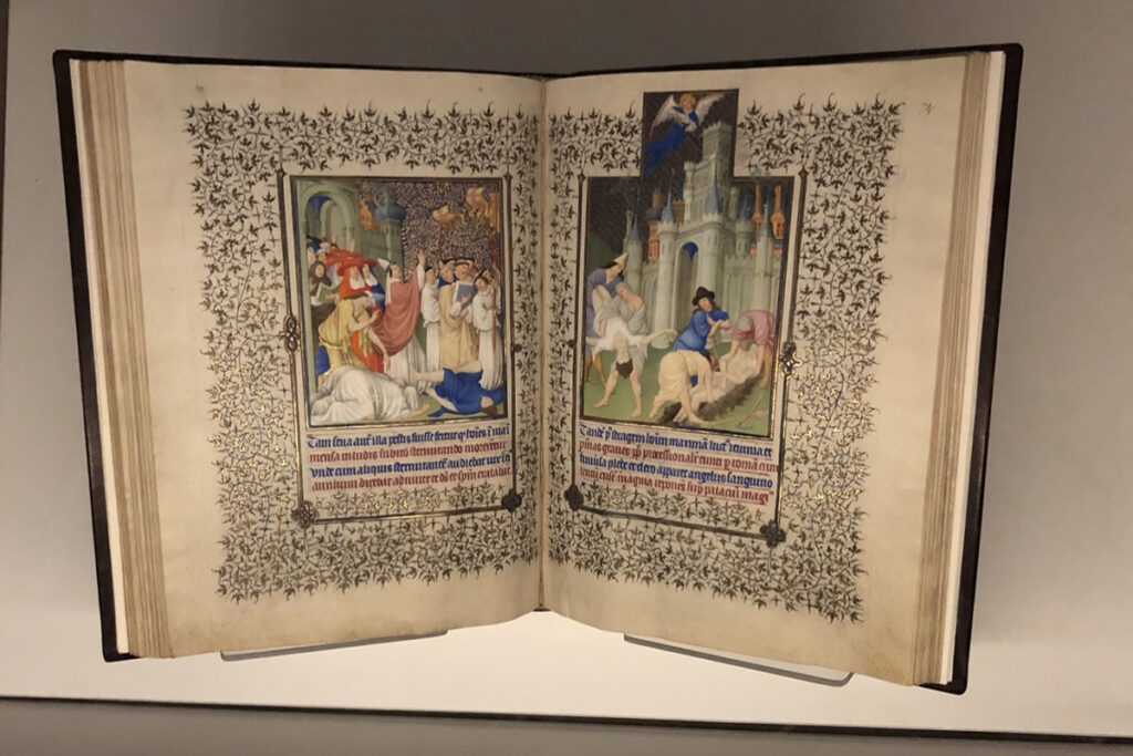 medieval manuscript with intricate drawings