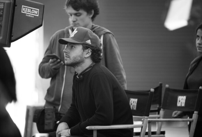 Danny Turkiewicz sits in director's chair