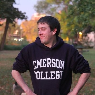 Adam Sennott wearing an Emerson College sweatshirt