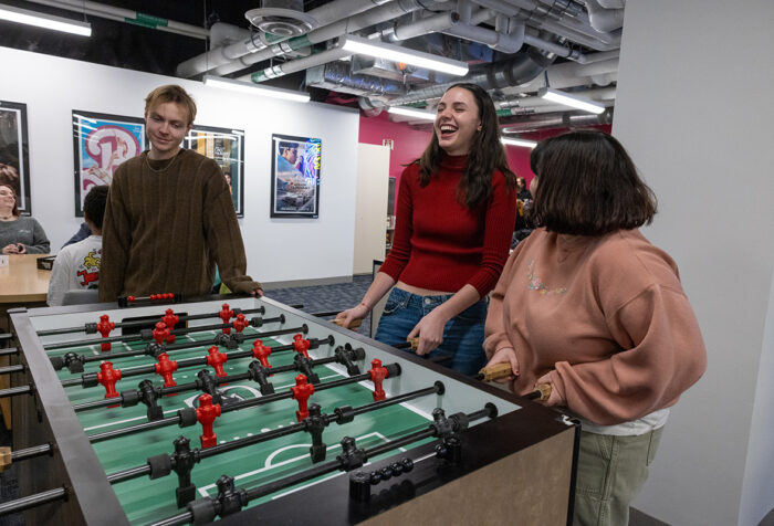 People play foosball