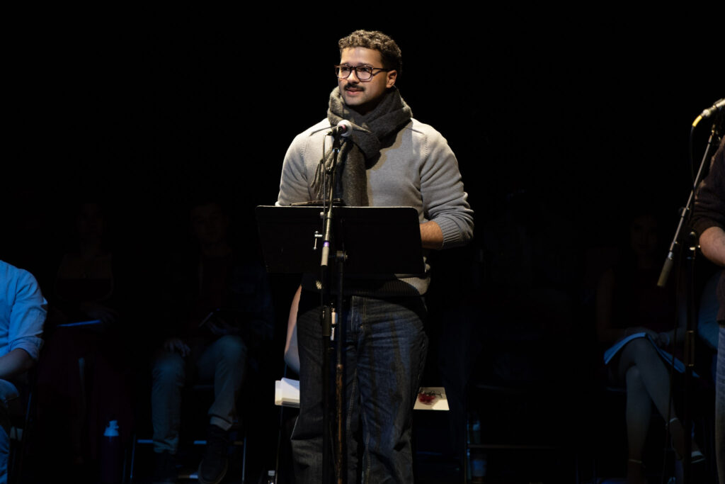 Cameron Parker in front of an easel