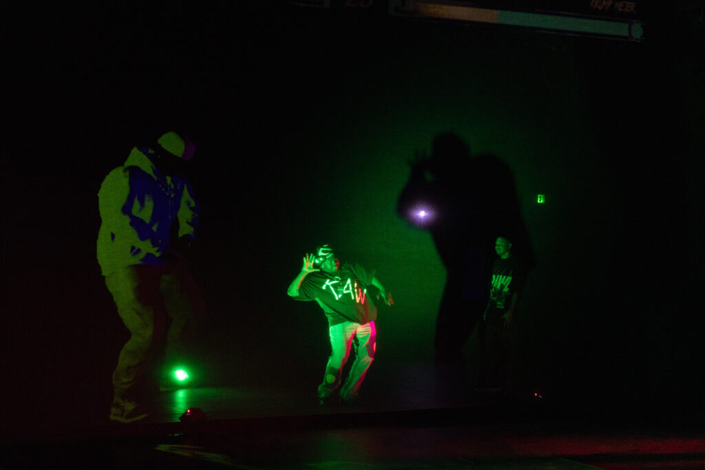 A musician performs on stage