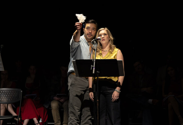 Sam Simakh next to Lauren Chapman while they rehearse