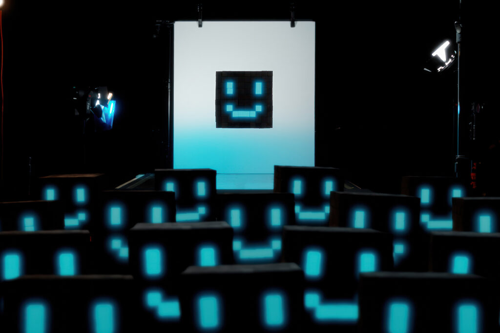 Digital smiley faces watching screen showing digital smiley face