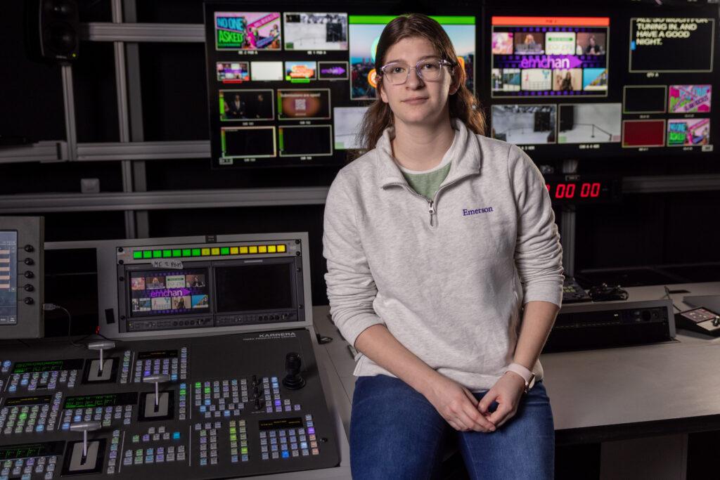 Jamie Gerber sits in a control room