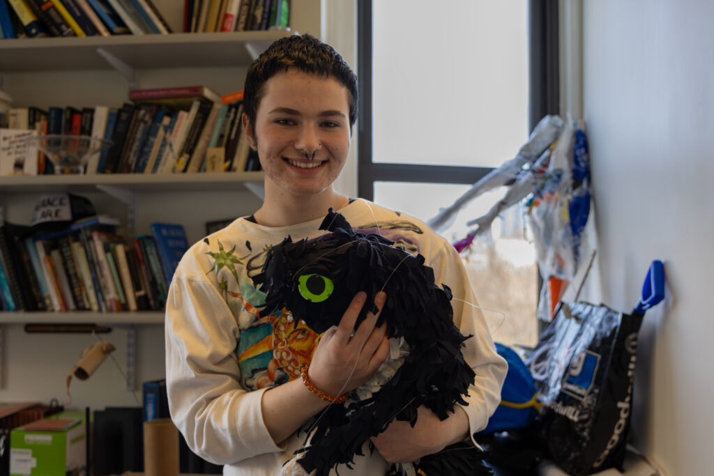 Nel Blinman holds a puppet she made