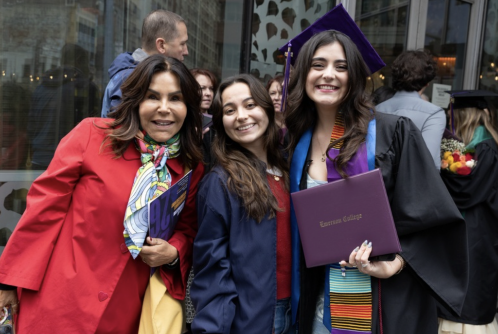 Three people pose for a photo