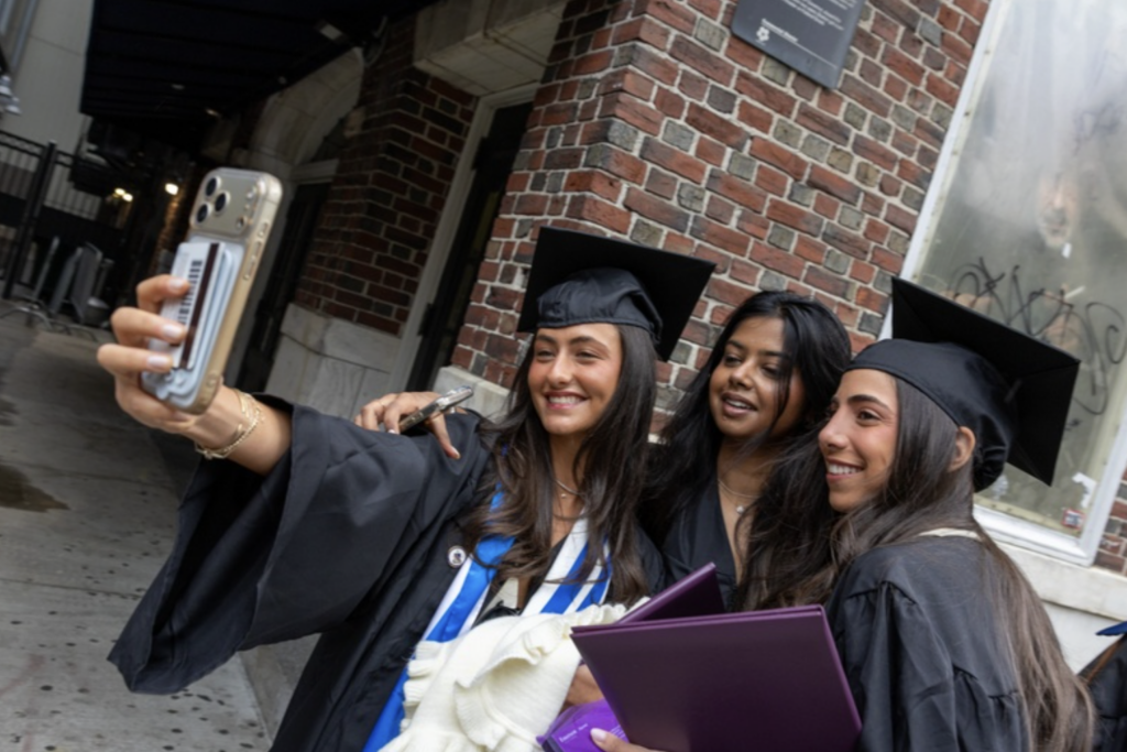 Three people take a selfie