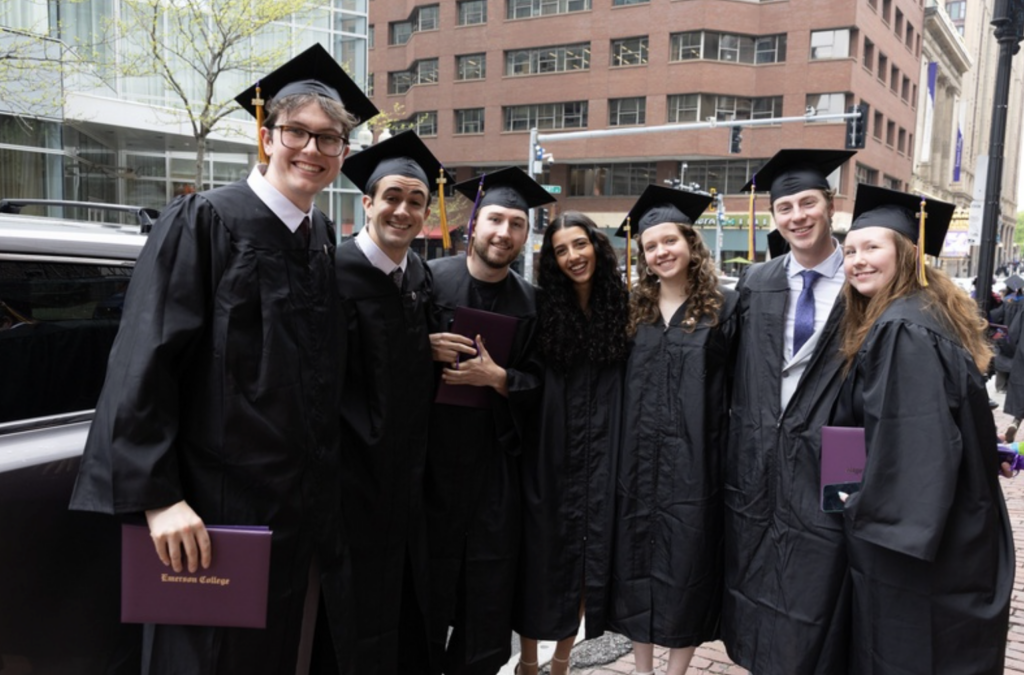 Six people pose for the camera