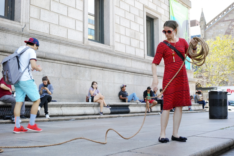 Catherine D'Ignazio lays down rope in front of the BPL