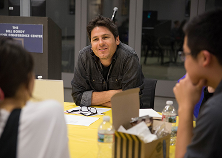 Alumni advisor Paul J. Morra listens to his student group during a roundtable discussion at the Emerson LA Career Advisory Network.