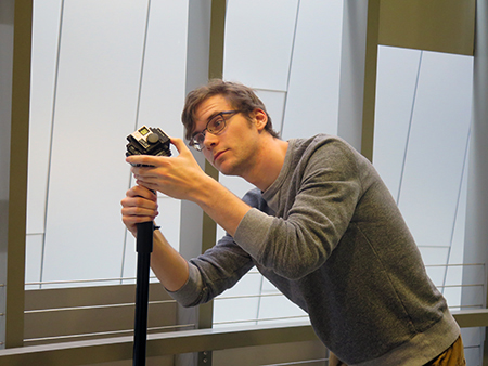 Jack Siberine '16 prepares to film with a GoPro rig. Photo/Daryl Paranada