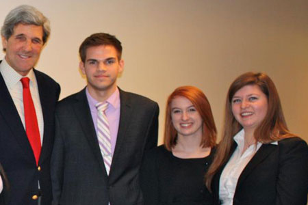 Headshot of U.S. Senator John Kerry with Emerson students