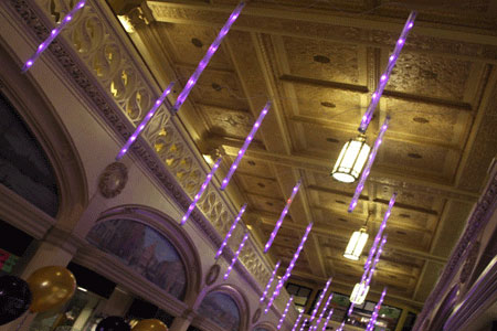 Purple lights hanging from the ceiling in Little Building