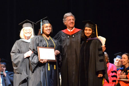 Nancy Daniel and Michael Taylor with graduates